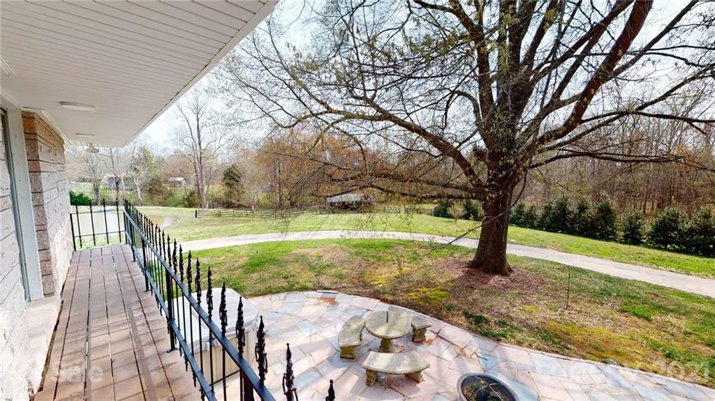 185 Rainey Road Salisbury, NC 28146 - Photo 46 of 47 a view of a yard with an outdoor space
