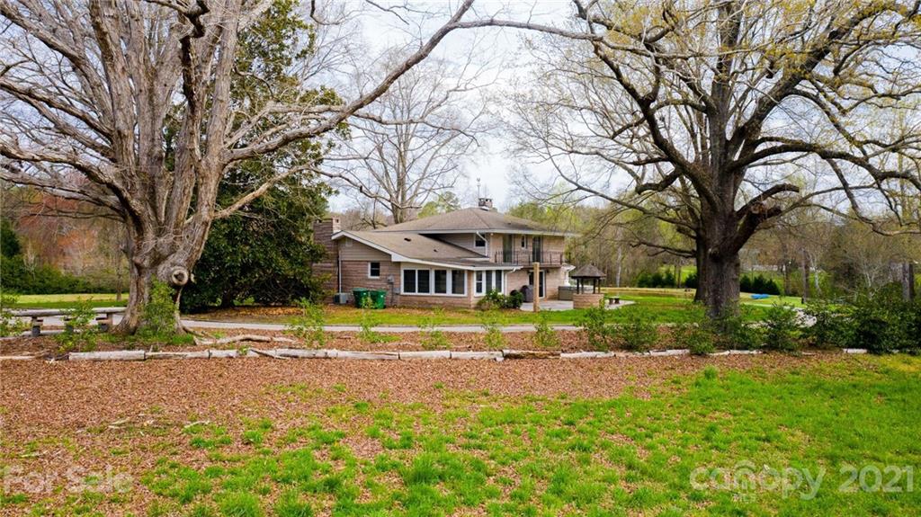 185 Rainey Road Salisbury, NC 28146 - Photo 9 of 47 a front view of a house with a yard