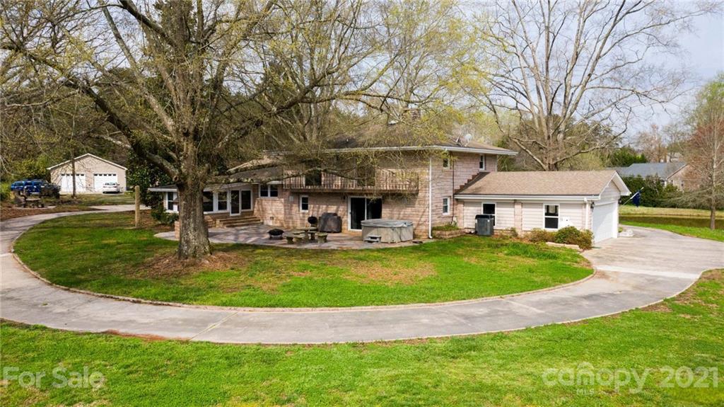 185 Rainey Road Salisbury, NC 28146 - Photo 10 of 47 a view of a house with swimming pool and porch