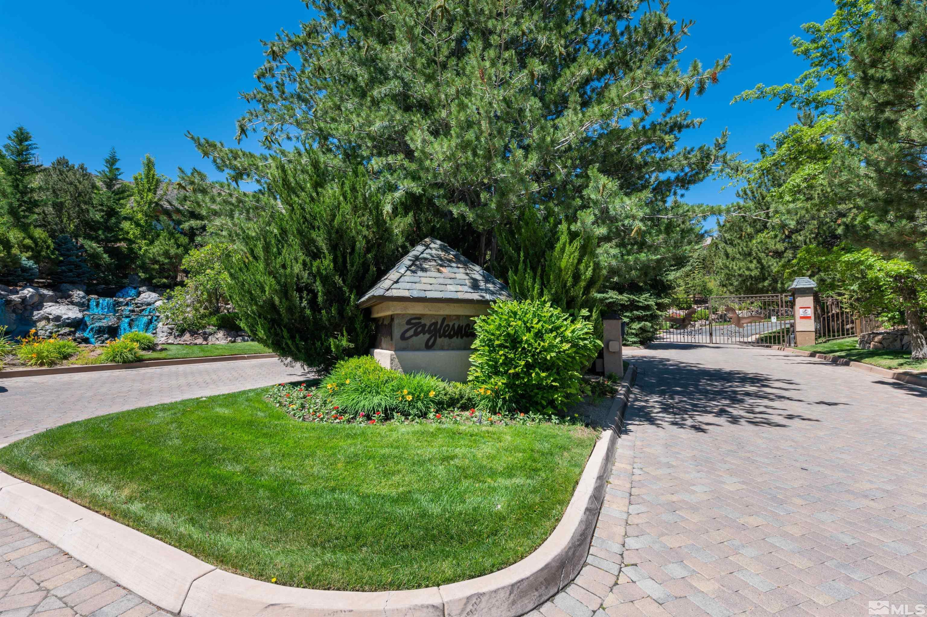 4395 Sharps Road, Unit 714A Reno, NV 89519 - Photo 8 of 15 a view of a garden with a fountain