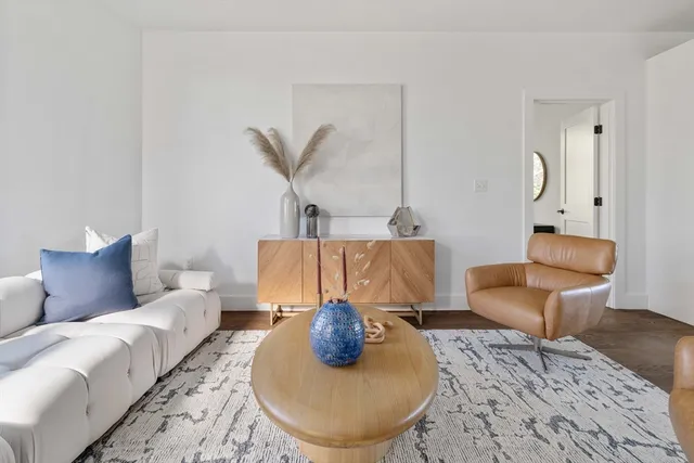 a bed room with furniture and a couch