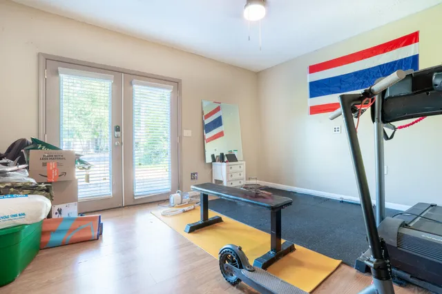 a room with furniture and air hockey table