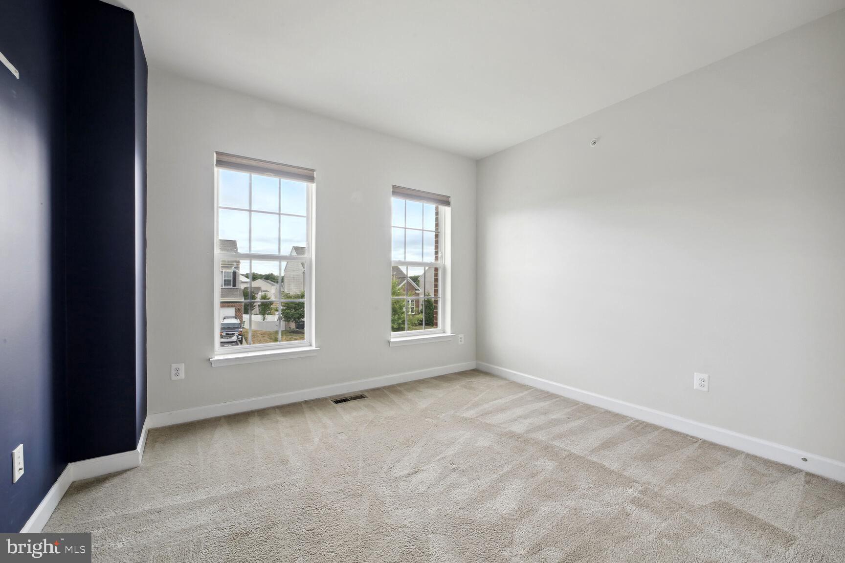 6201 Hunt Weber Drive Clinton, MD 20735 - Photo 19 of 30 an empty room with windows