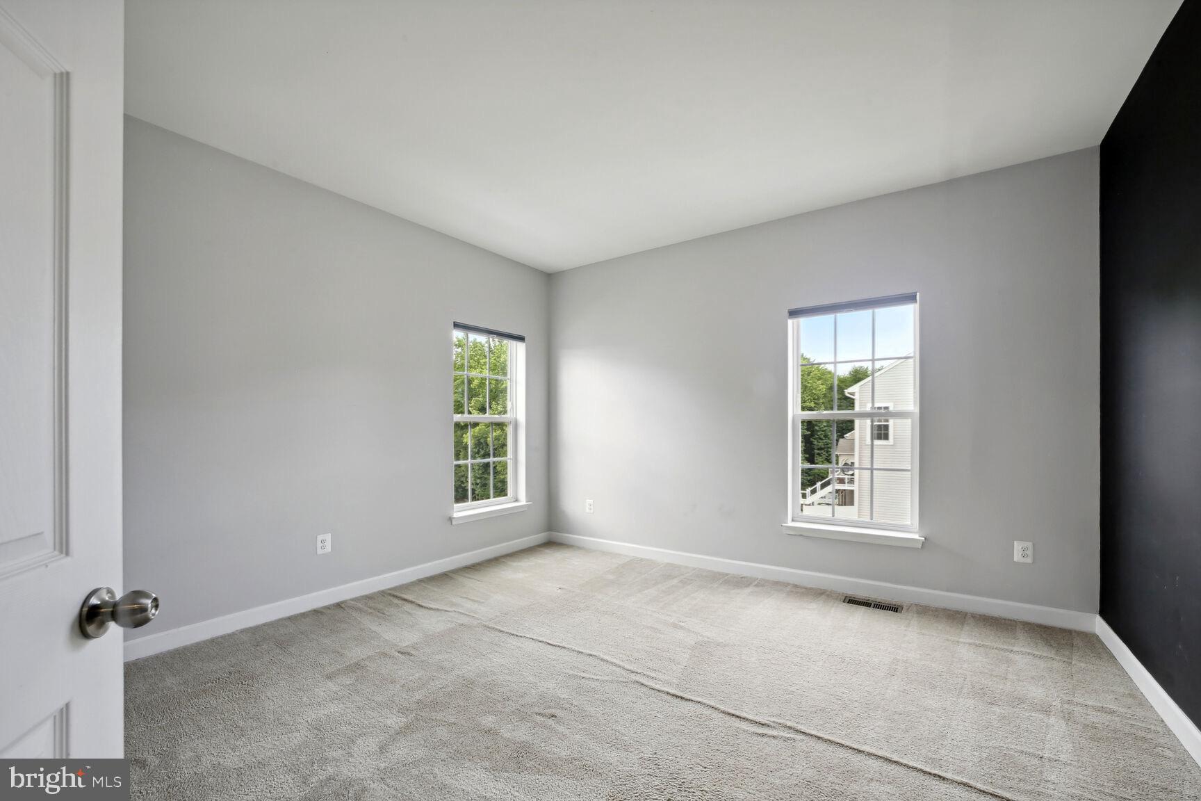 6201 Hunt Weber Drive Clinton, MD 20735 - Photo 21 of 30 an empty room with windows