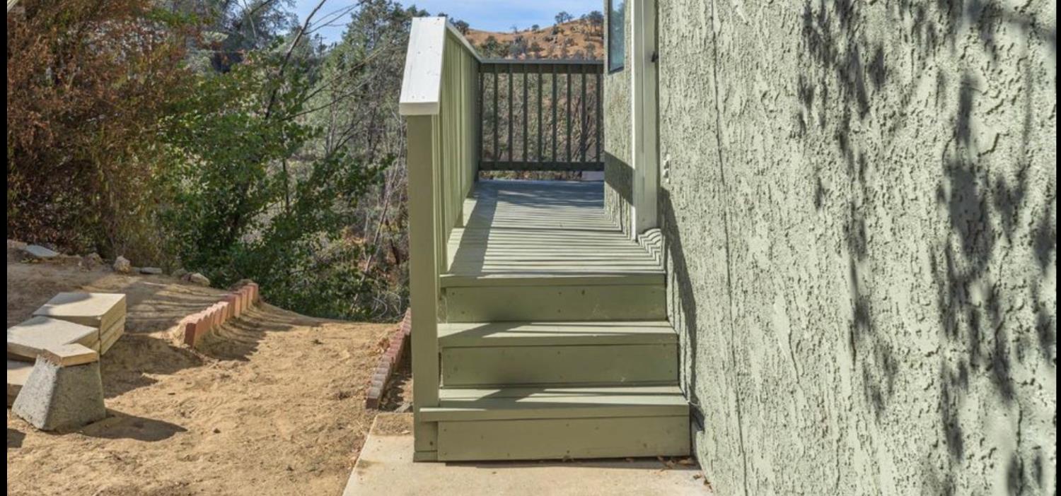 27817 Sky Harbour Road Friant, CA 93626 - Photo 4 of 36 a view of entryway with wooden door