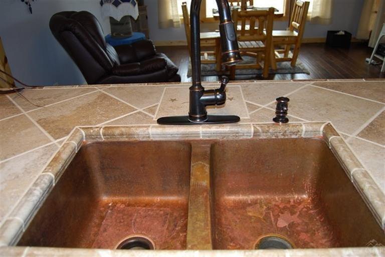 9343 Southwest Meadow Road Terrebonne, OR 97760 - Photo 12 of 23 Copper sink in kitchen. Oil rubbed bronz