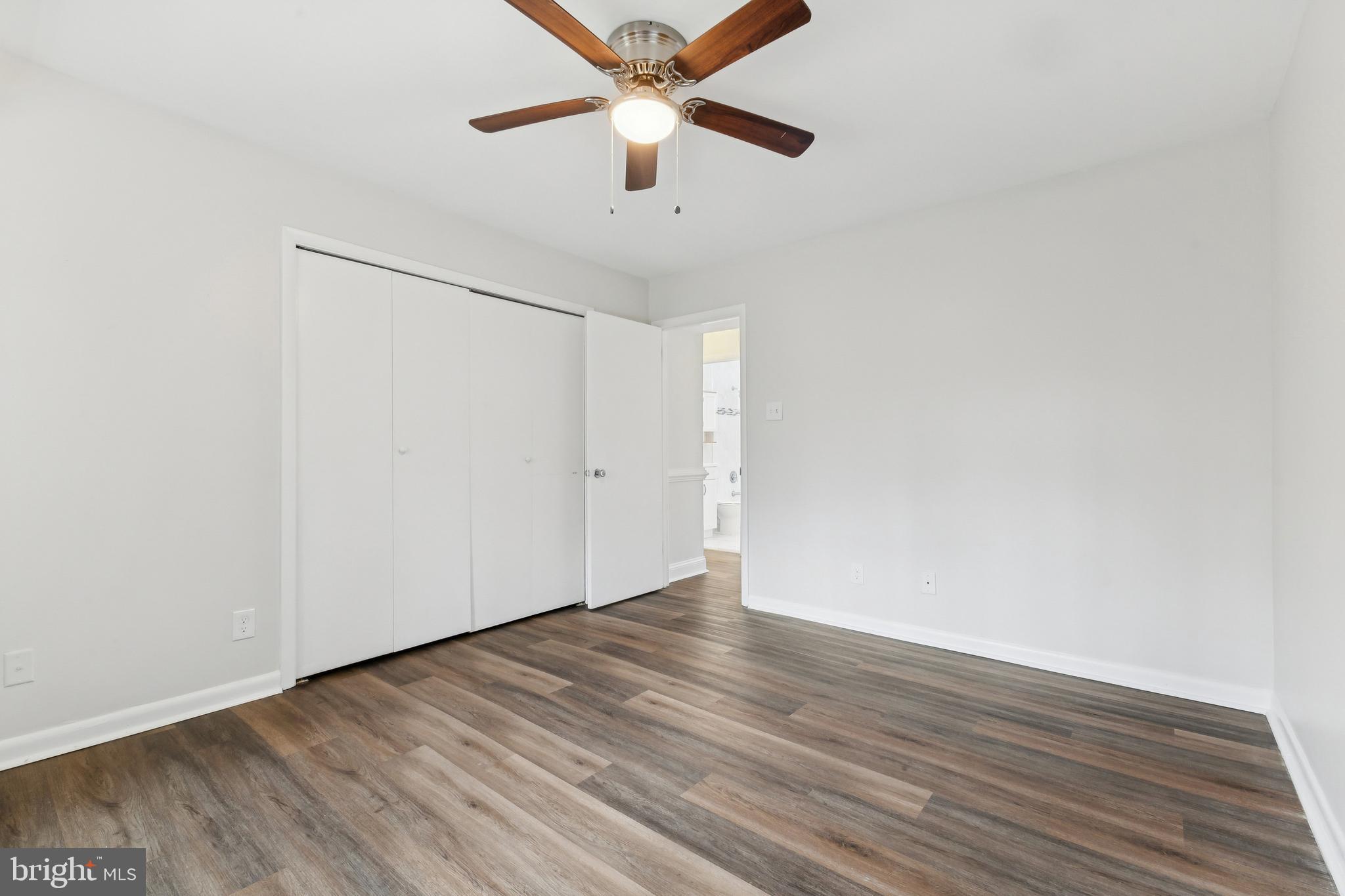 11611 Vantage Hill Road, Unit 11B Reston, VA 20190 - Photo 14 of 17 a view of an empty room with wooden floor