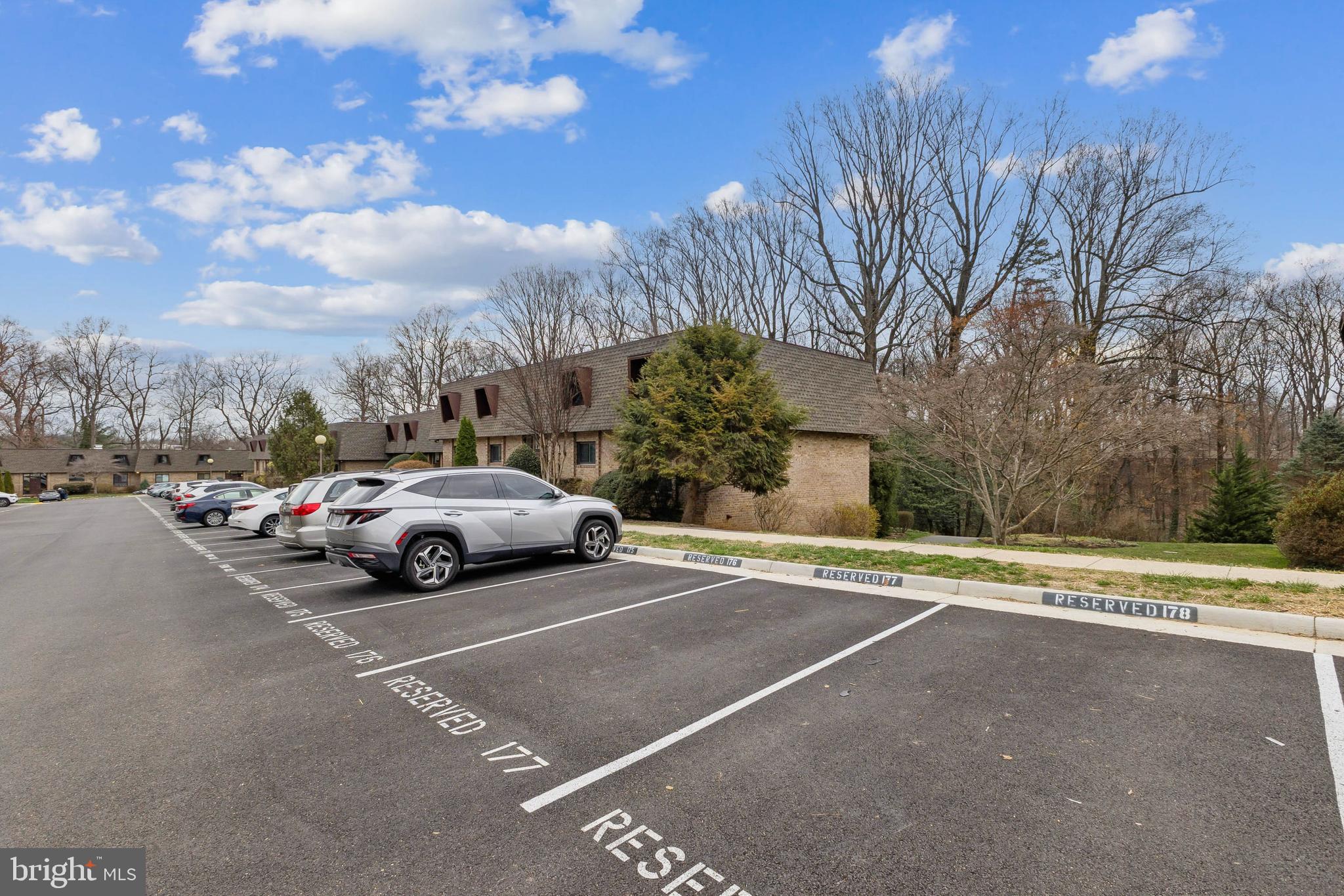 11611 Vantage Hill Road, Unit 11B Reston, VA 20190 - Photo 3 of 17 a view of a car parked on the side of the road