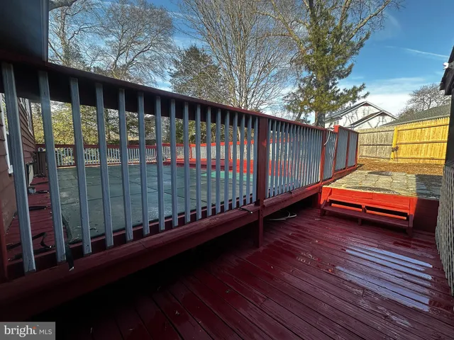a view of balcony with wooden floor