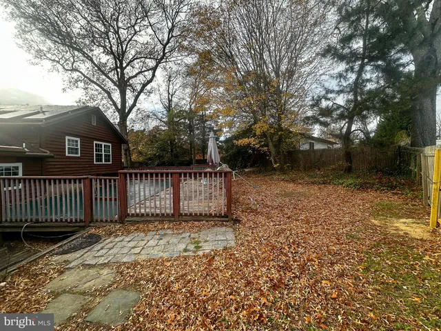 a view of a wooden fence