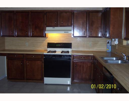6269 Easley Lane Sandia, TX 78383 - Photo 2 of 9 a kitchen with a sink and cabinets