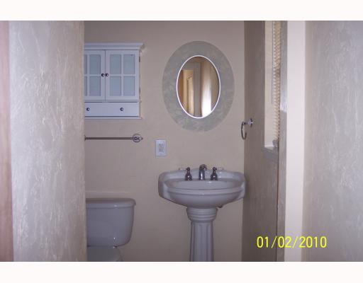 6269 Easley Lane Sandia, TX 78383 - Photo 7 of 9 a bathroom with a sink and a mirror