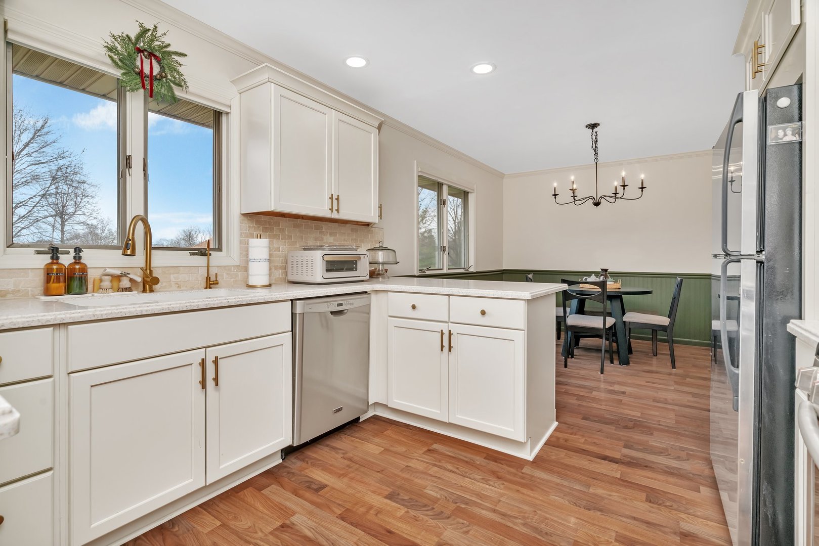 218 San Carlos Road Minooka, IL 60447 - Photo 14 of 40 a kitchen with a sink cabinets and window