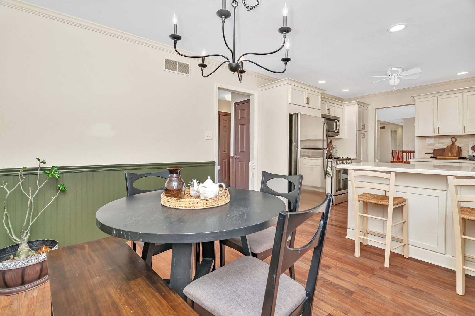 218 San Carlos Road Minooka, IL 60447 - Photo 16 of 40 a view of a dining room with furniture and wooden floor