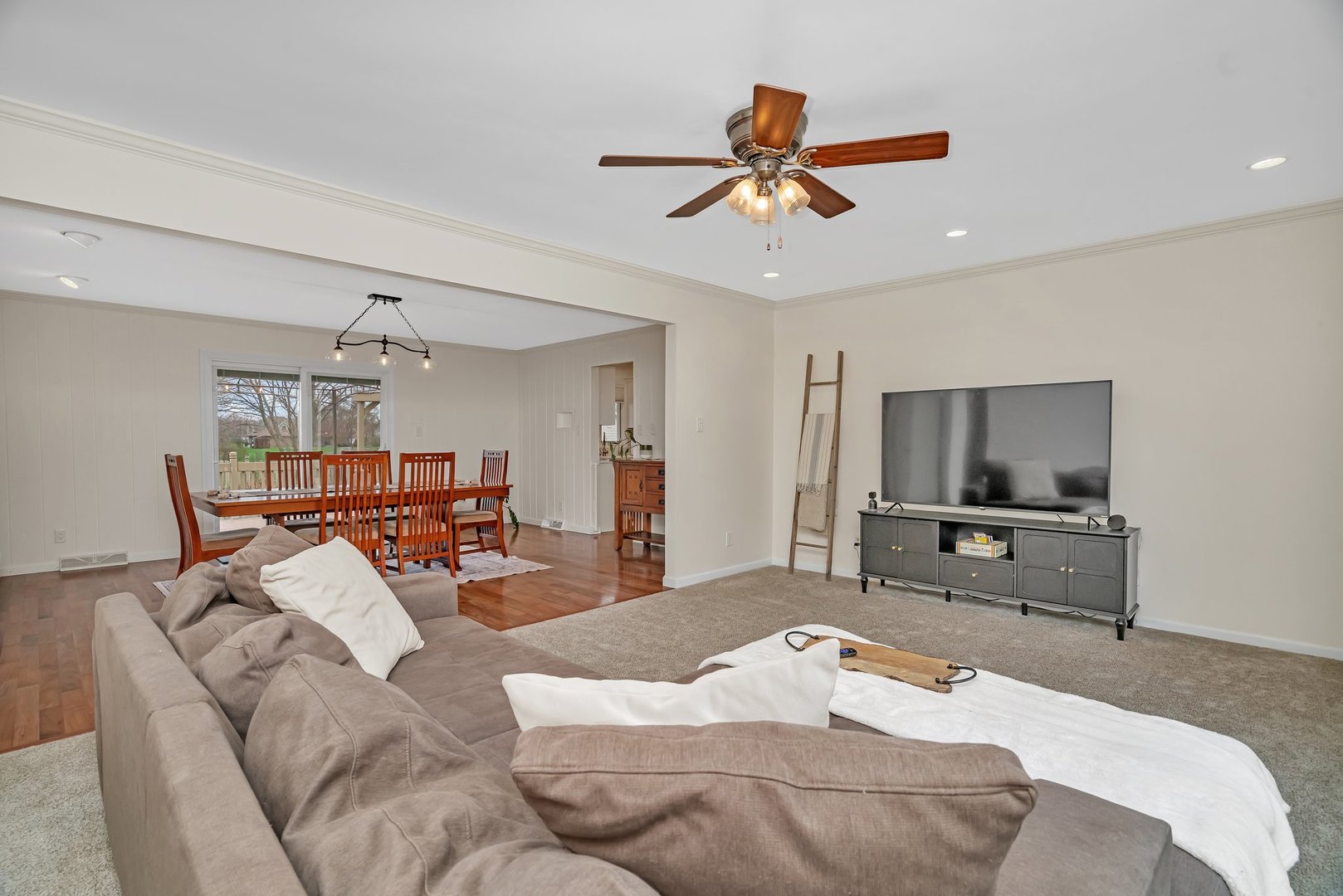 218 San Carlos Road Minooka, IL 60447 - Photo 22 of 40 a bedroom with a bed and a flat screen tv