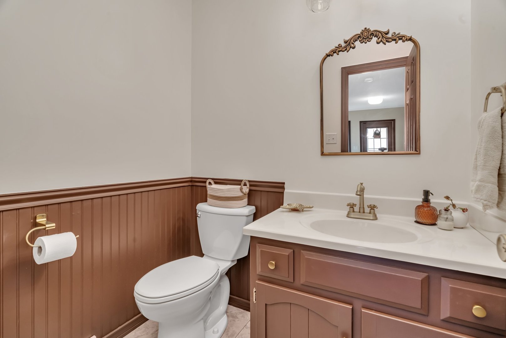218 San Carlos Road Minooka, IL 60447 - Photo 23 of 40 a bathroom with a toilet a sink and mirror