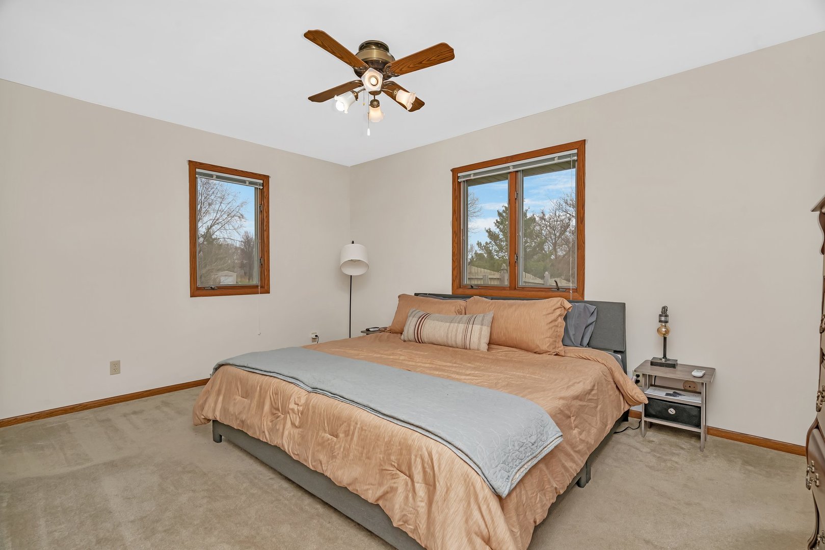 218 San Carlos Road Minooka, IL 60447 - Photo 24 of 40 a bedroom with a bed and a painting on the wall