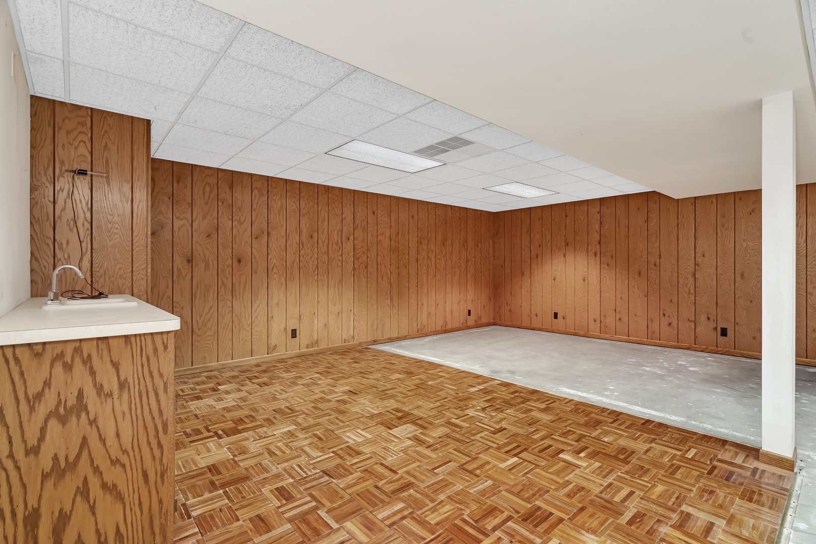 218 San Carlos Road Minooka, IL 60447 - Photo 33 of 40 a view of a room with a sink and wooden cabinets
