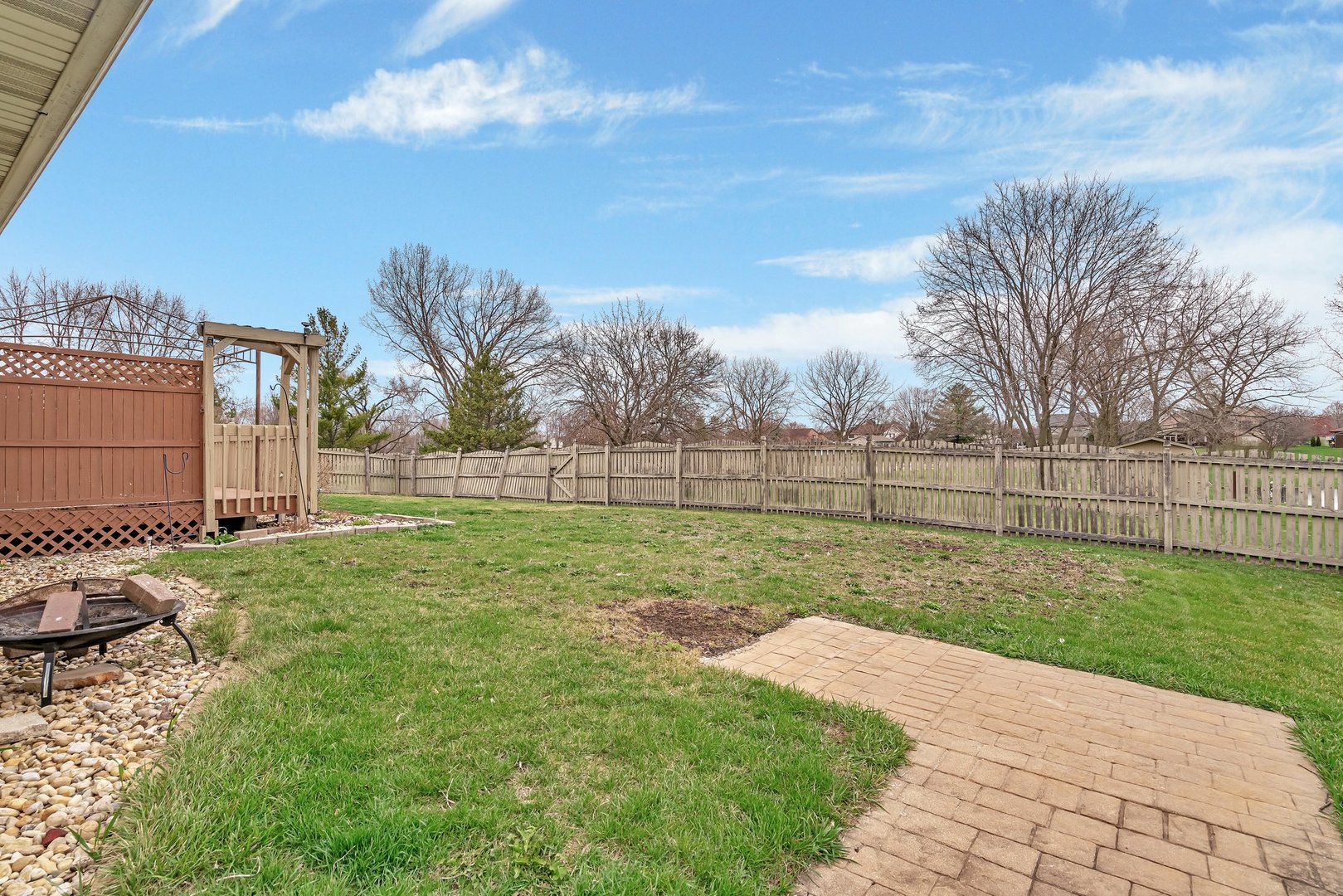 218 San Carlos Road Minooka, IL 60447 - Photo 40 of 40 a view of a yard with a trampoline