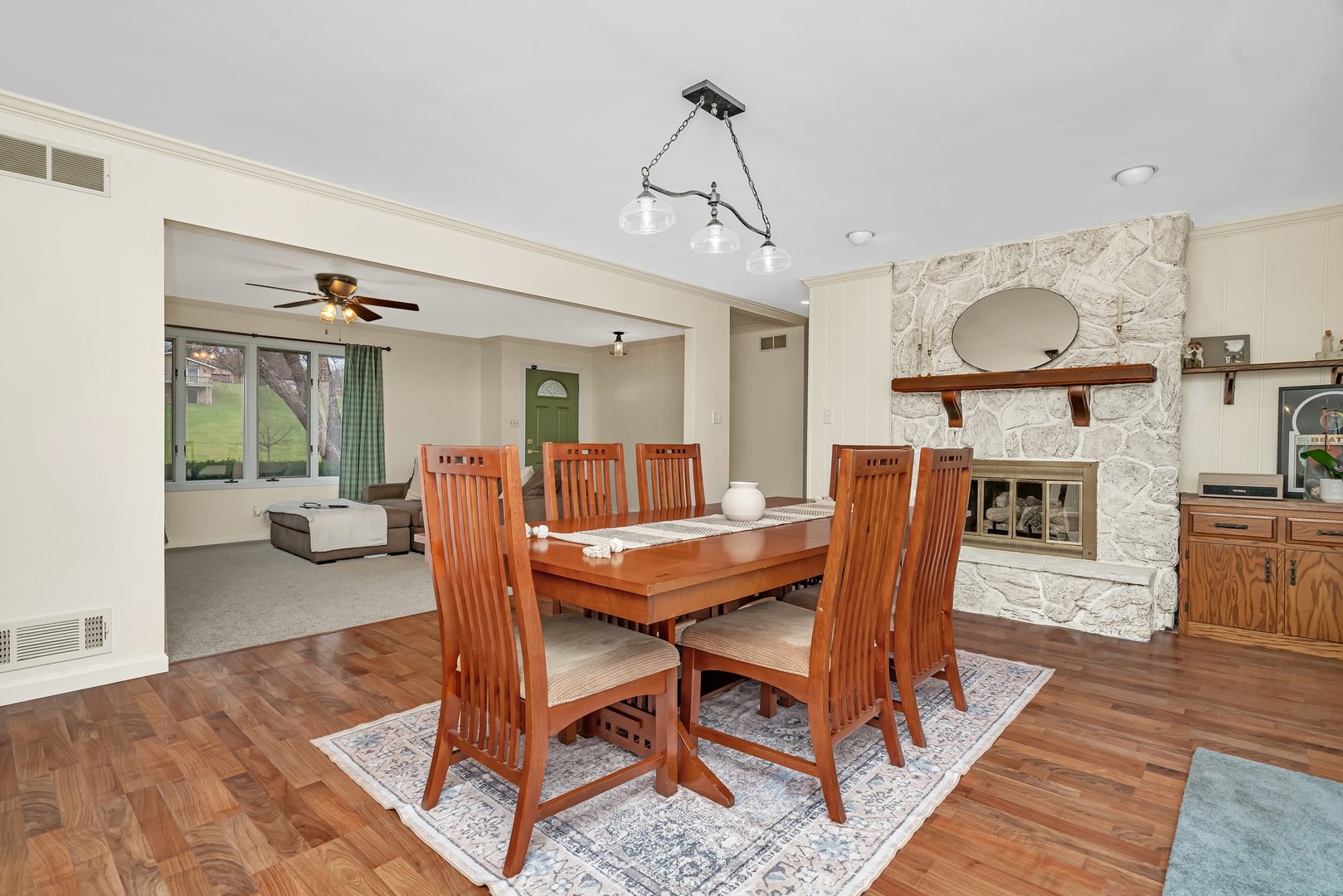 218 San Carlos Road Minooka, IL 60447 - Photo 7 of 40 a view of a dining room with furniture window and wooden floor