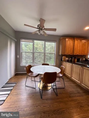 a bedroom with bed and a couch