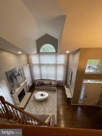 a bedroom with a large bed and a dresser