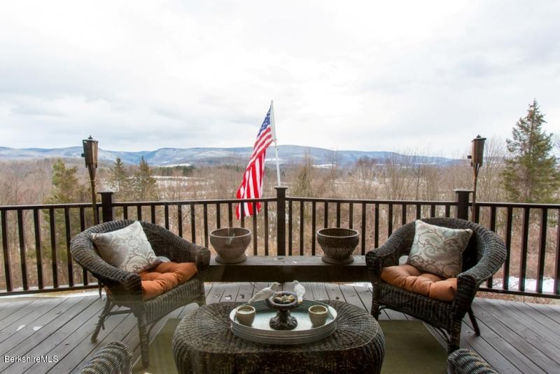 83 Sky Farm Road Copake, NY 12516 - Photo 15 of 38 a view of a balcony with furniture
