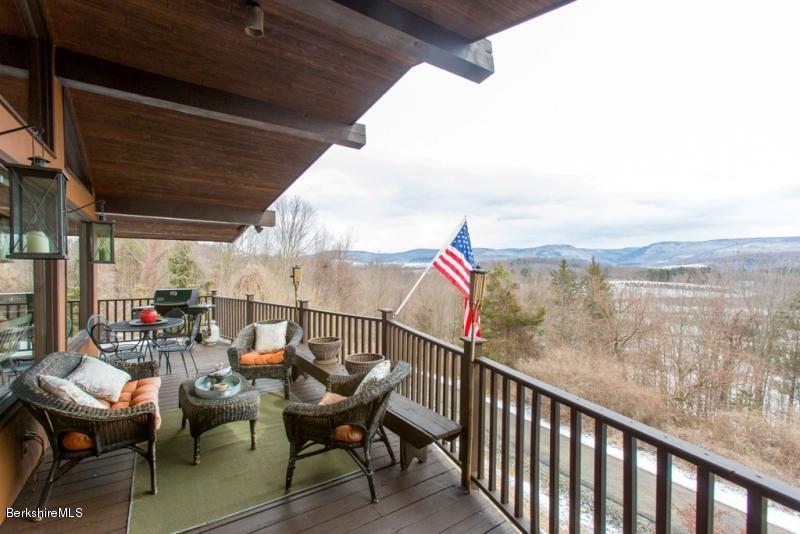 83 Sky Farm Road Copake, NY 12516 - Photo 16 of 38 a view of a balcony with furniture