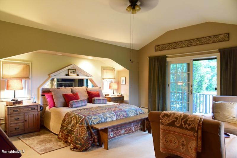 83 Sky Farm Road Copake, NY 12516 - Photo 19 of 38 a bedroom with a bed and a couch