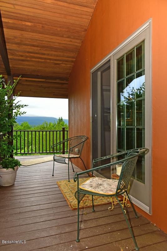 83 Sky Farm Road Copake, NY 12516 - Photo 37 of 38 a view of a house with a porch
