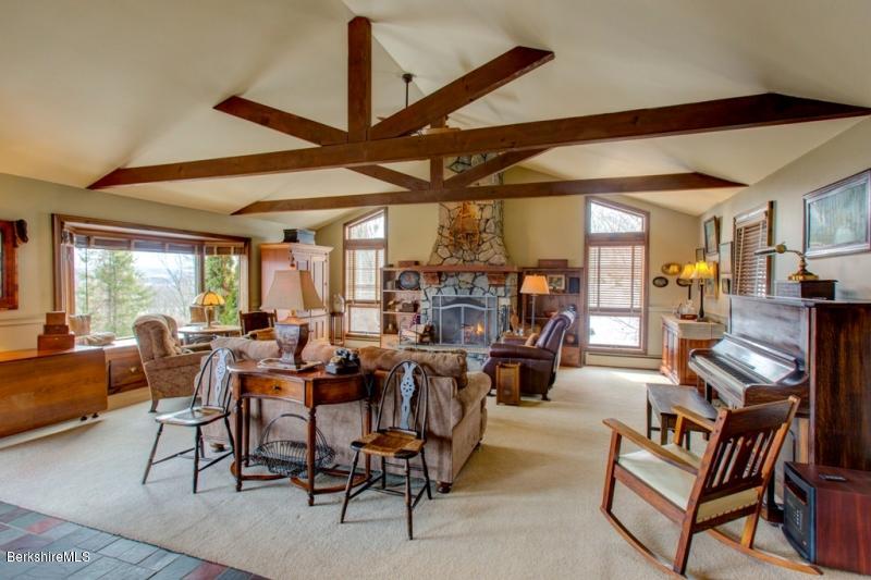 83 Sky Farm Road Copake, NY 12516 - Photo 6 of 38 a view of a dining room with furniture window and outside view