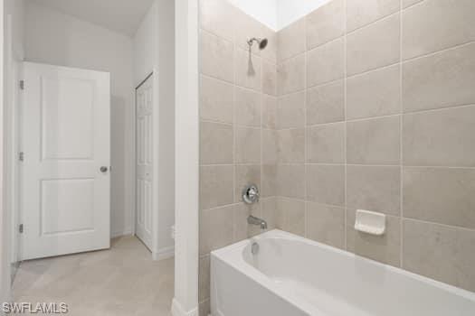2841 Citrus Street Naples, FL 34120 - Photo 15 of 28 Full bathroom featuring shower / bathtub combination and baseboards