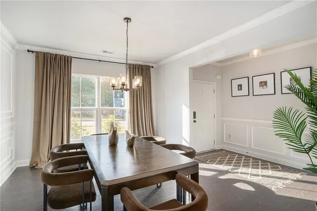 a view of a livingroom with furniture and window