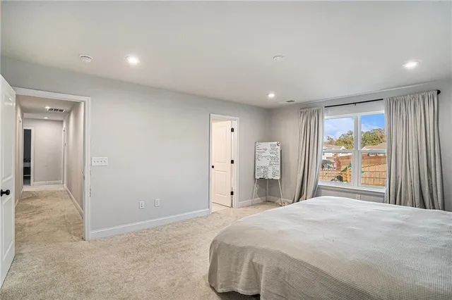 a bedroom with a large bed