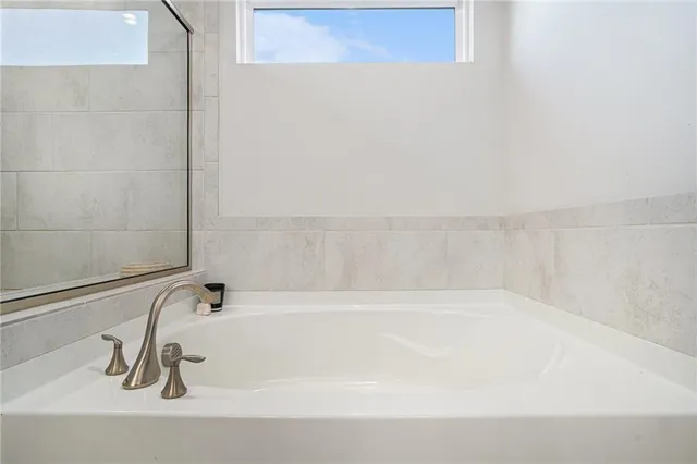 a bathroom with a bathtub