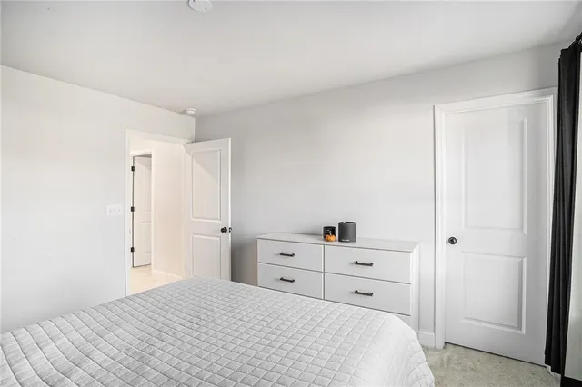 a room that has a bed and a closet