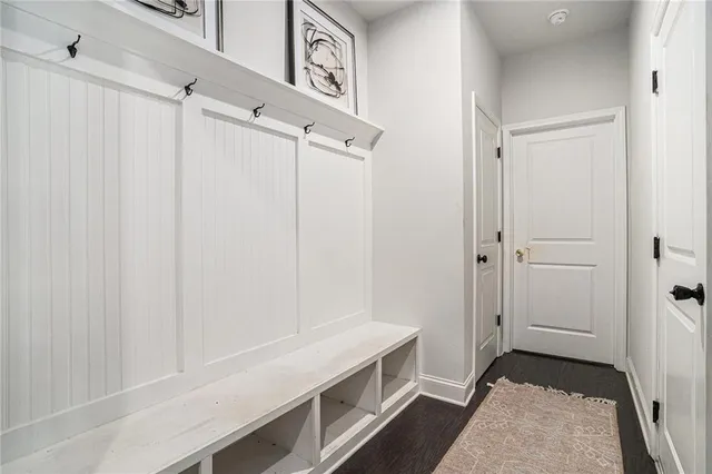 a bathroom with a shower and a sink
