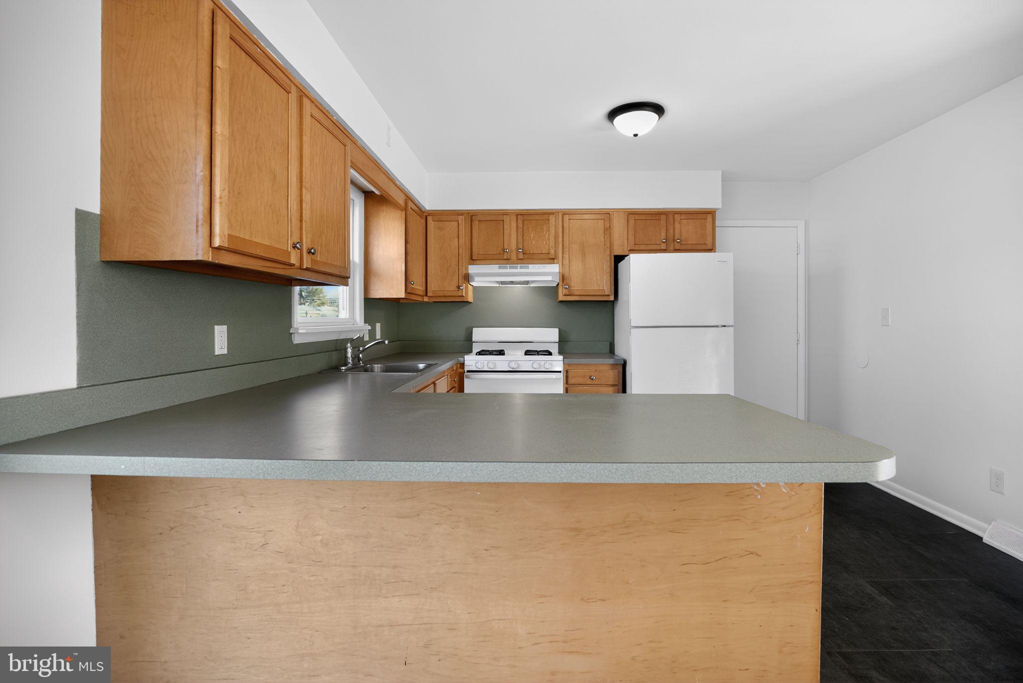 462 East Elmer Road Vineland, NJ 08360 - Photo 13 of 30 a view of kitchen with furniture and wooden floor