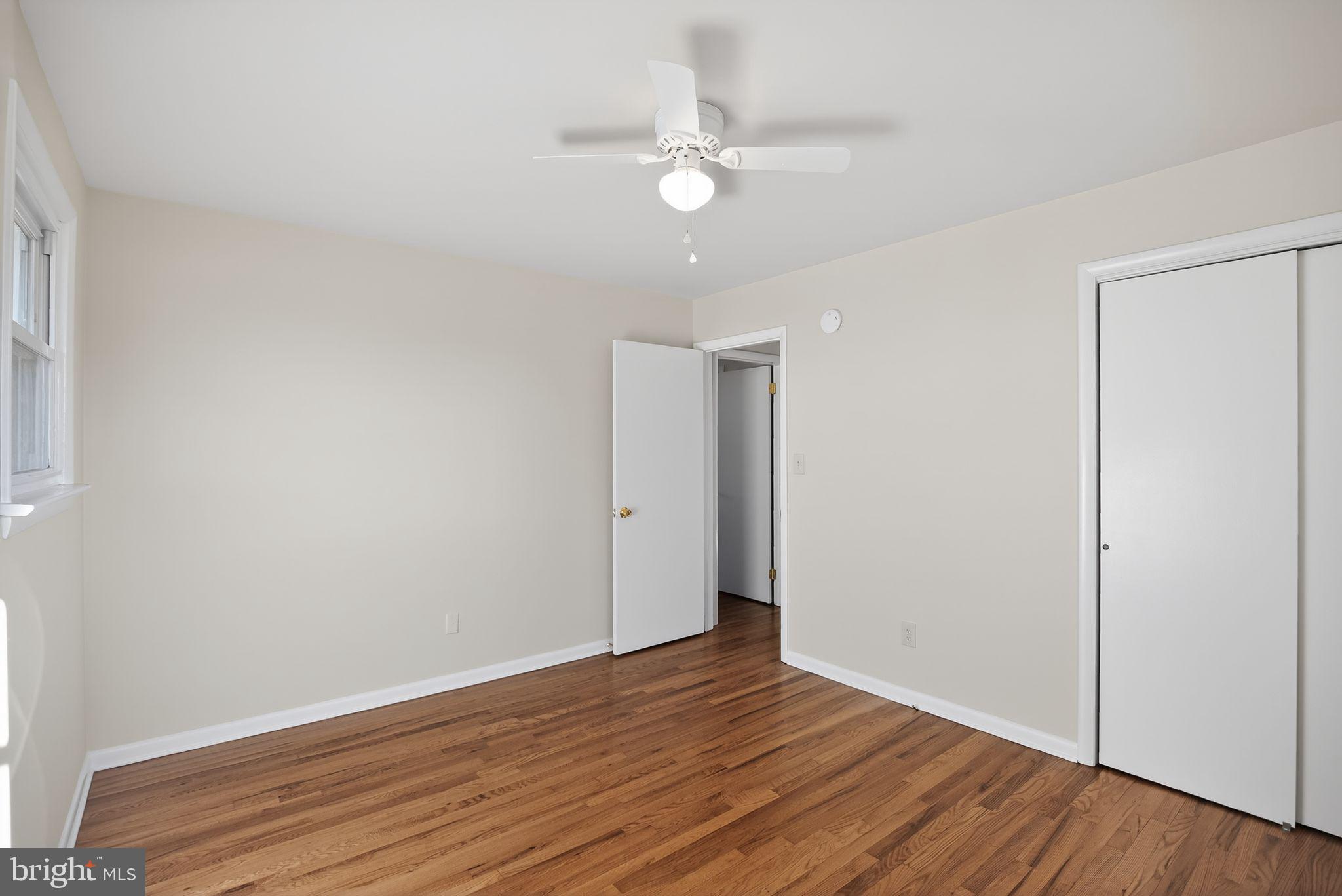 462 East Elmer Road Vineland, NJ 08360 - Photo 23 of 30 a view of an empty room with wooden floor
