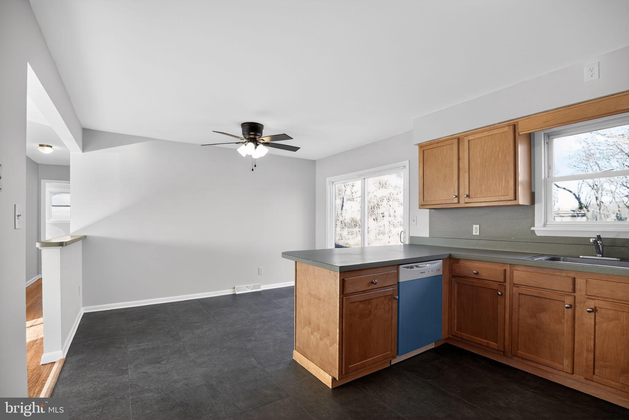 462 East Elmer Road Vineland, NJ 08360 - Photo 9 of 30 a kitchen with a sink cabinets and window