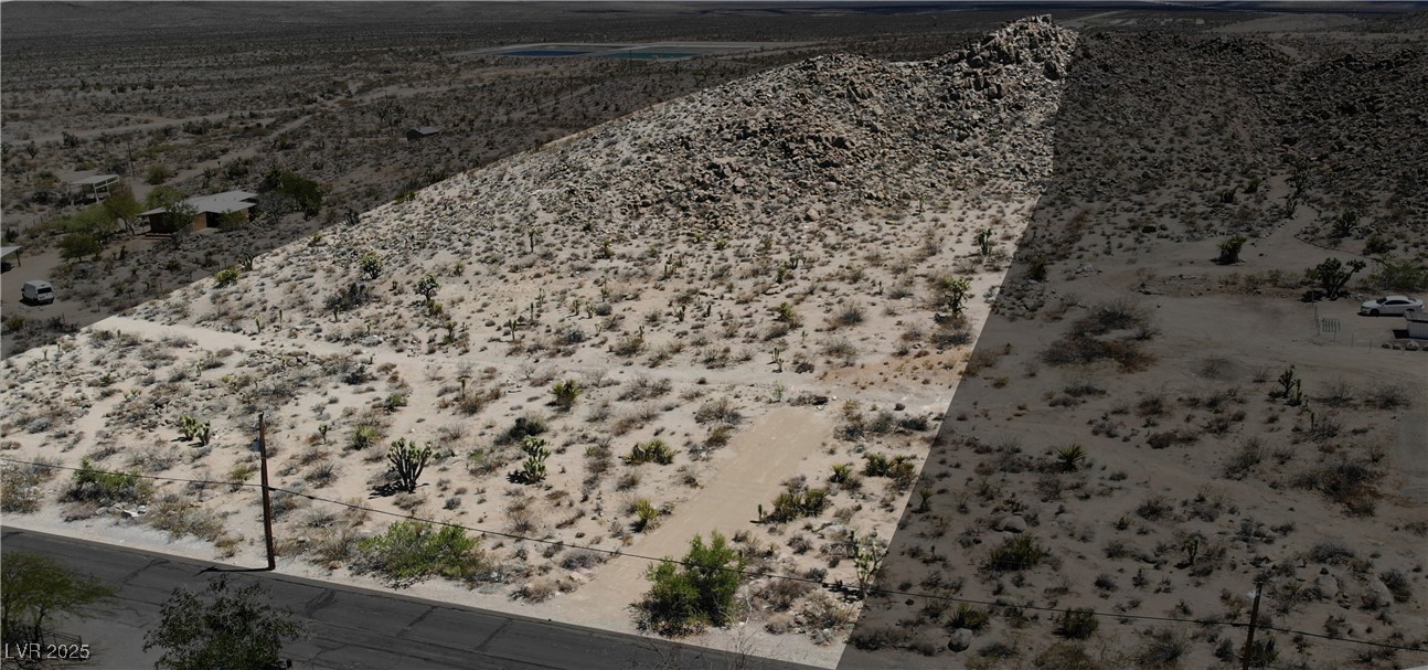 Aerial view of sparsely populated area featuring a desert landscape