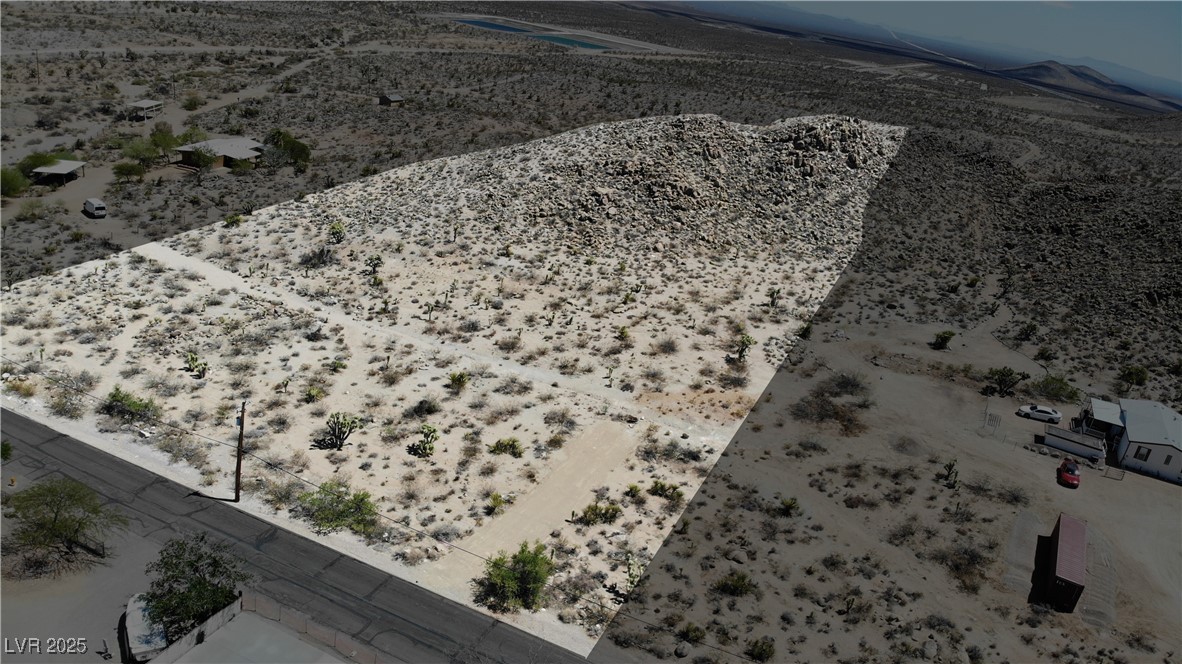 East Hobson Street Searchlight, NV 89046 - Photo 3 of 14 Aerial view of sparsely populated area with a desert landscape and mountains