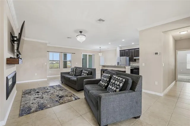 a living room with furniture and a couch