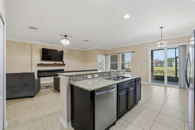 a kitchen with a stove and a sink