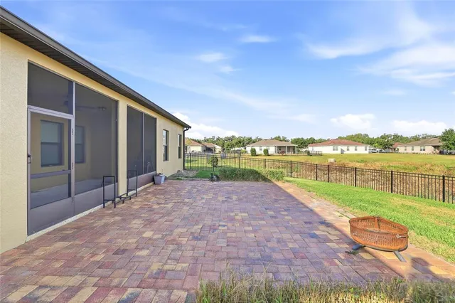 a view of swimming pool with outdoor space and seating area