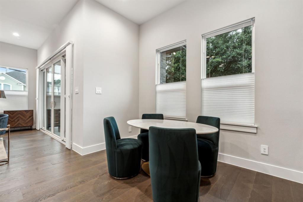 4109 Maison Ridge Dallas, TX 75219 - Photo 11 of 39 a view of a workspace with furniture and a window