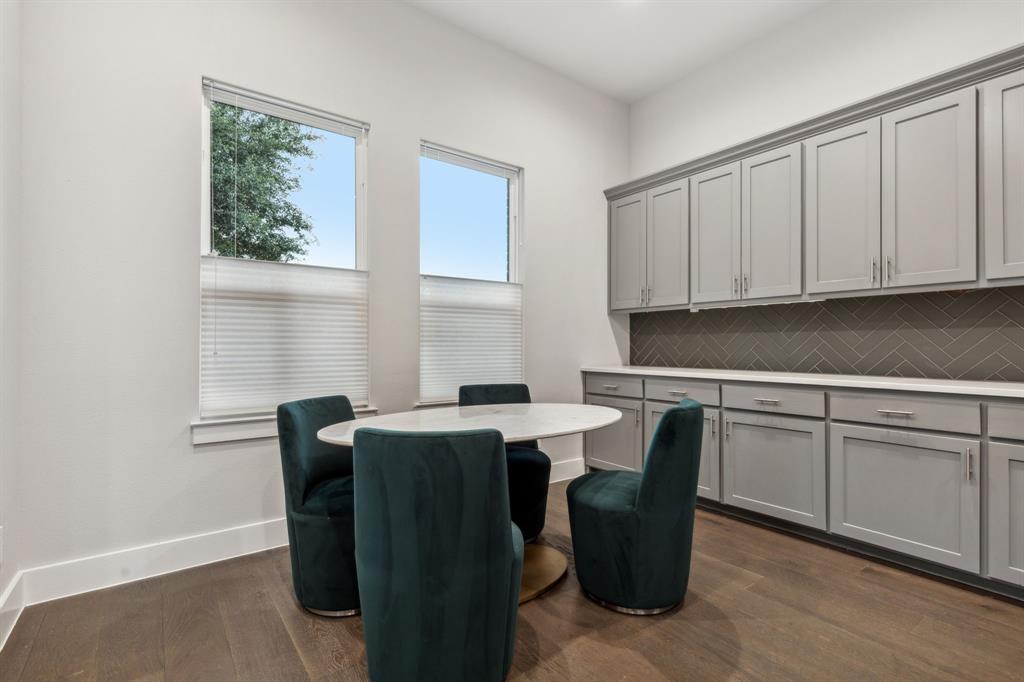 4109 Maison Ridge Dallas, TX 75219 - Photo 12 of 39 Dining space with dark hardwood / wood-style flooring