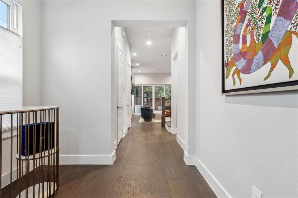 4109 Maison Ridge Dallas, TX 75219 - Photo 13 of 39 wooden floor in a hall with an entryway