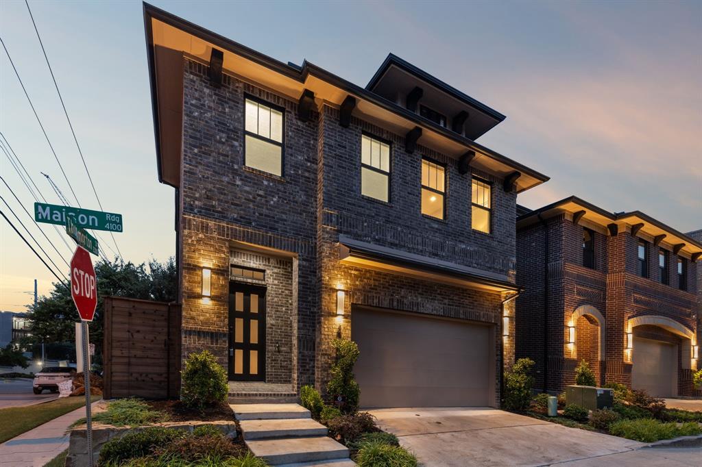 4109 Maison Ridge Dallas, TX 75219 - Photo 34 of 39 View of front of house with a garage