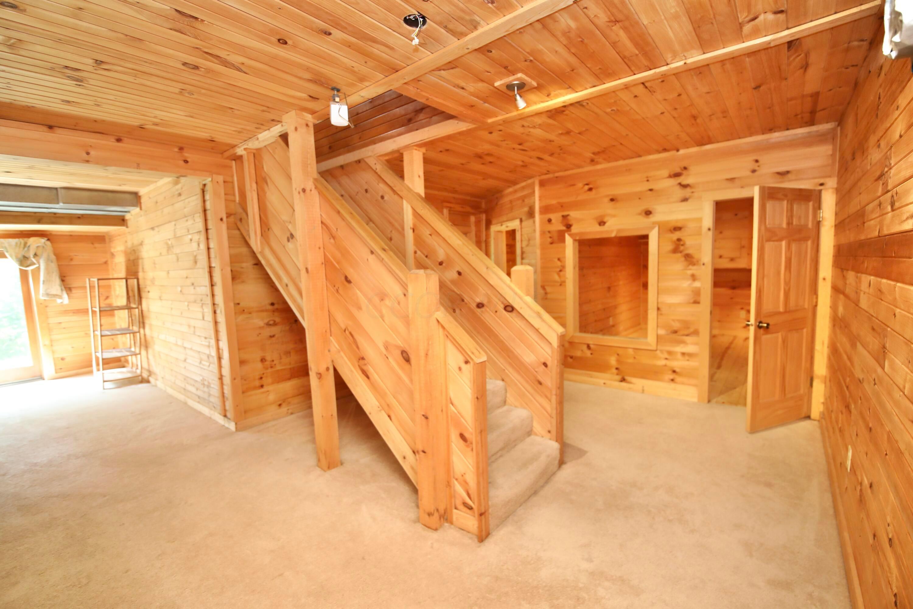 538 Armstrong Road Delaware, OH 43015 - Photo 12 of 109 carpeted entertainment room and 3 other rooms